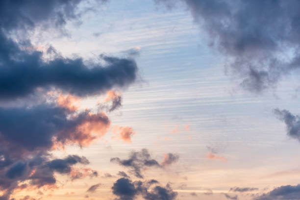 istock sunset background. sky with soft and blur pastel colored clouds. sunshine through the gradient cloud on the beach resort. nature. sunrise.  peaceful morning 1170926914