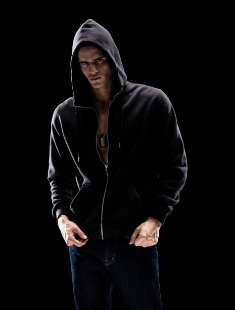 istock Handsome man wearing hooded shirt / jacket on blackground 1170927764