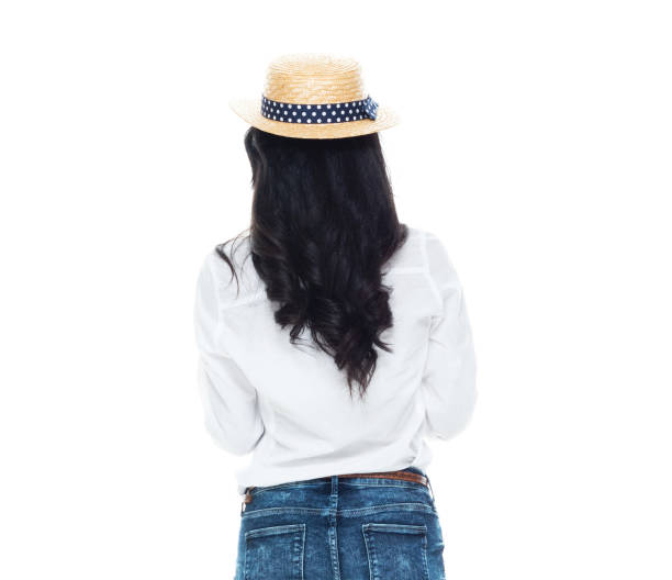 istock Beautiful Latino female in cute outfit on white background - using tablet 1170929457