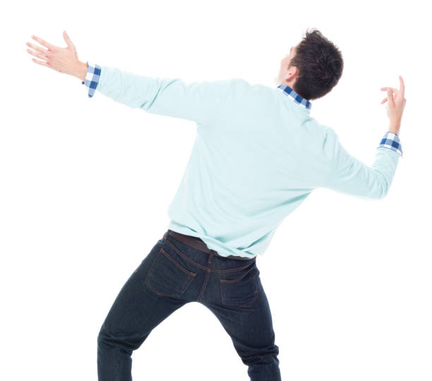 istock Handsome young man looking up in surprise 1170933116