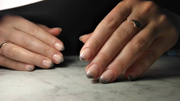 istock Camouflage manicure with gray spray 1170934348