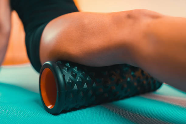 istock Using Foam Roller for Muscle and Fascia Massage 1170938236