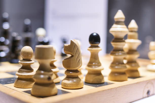 istock Close-Up Of Chess Pieces On Board 1170938686
