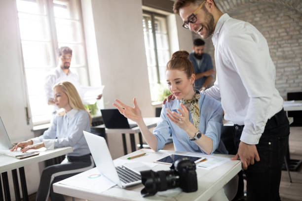 istock Business, technology and people concept - creative team or designers working in office 1170941196