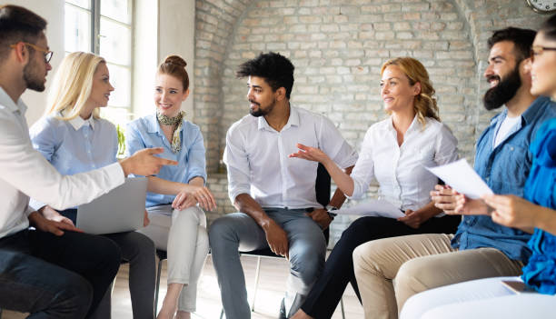 istock Startup business team on meeting in modern bright office interior brainstorming, working on computer 1170941828