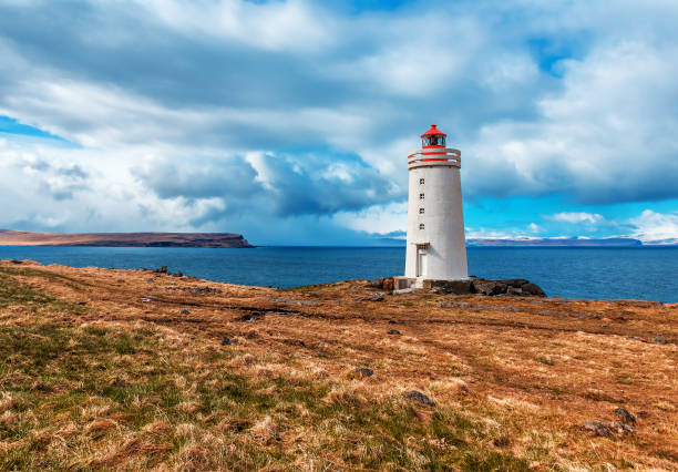 istock White lighthouse on the sea shore. Skardsviti Lighthouse 1170942252