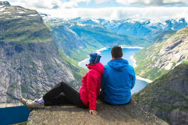 Couple posing on Trolltunga Norway