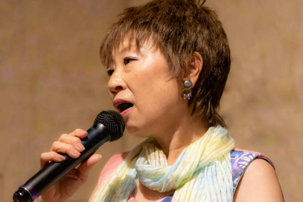 istock Senior women enjoying Karaoke 1170951170