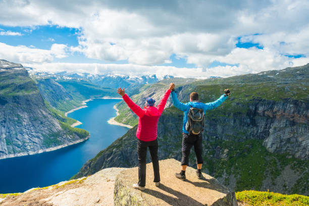istock Couple posing on Trolltunga Norway 1170951230