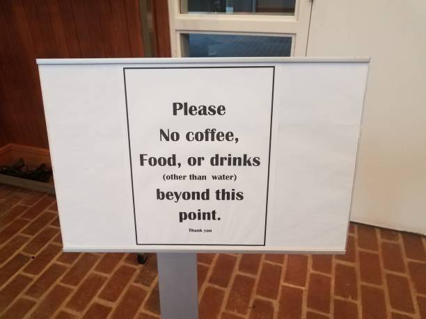 istock please no coffee food or drinks other than water beyond this point sign 1170951783