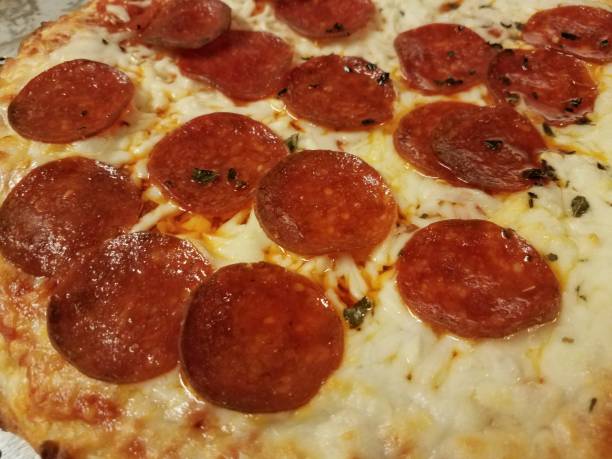 istock hot pepperoni meat pizza with melted cheese 1170951817