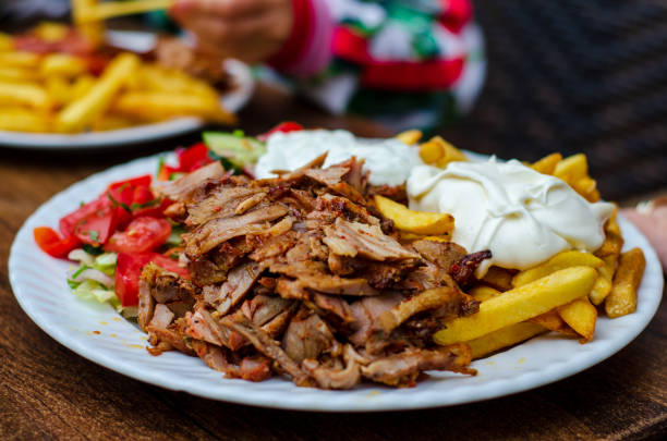 Doner meat with french fries Doner meat with french fries kebab photos stock pictures, royalty-free photos & images