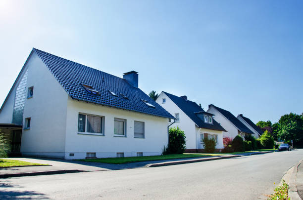 Street in a residential area with cottages stock photo