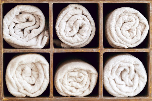 istock Spa Towels Stacked on Shelves 1170959561