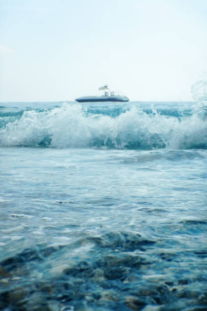 Beach View Motor Boat Floating on clear Turquoise Water, Summer Concept
