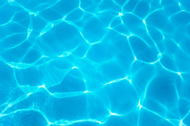 istock Swimming Pool water. Ripple Water. Sun Reflection background. 1170960377