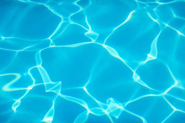istock Swimming Pool water. Ripple Water. Sun Reflection background. 1170961481
