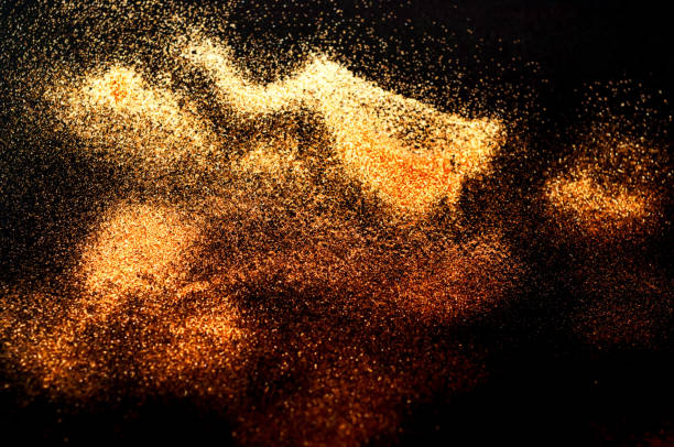 istock Black background with golden sparkles. Blurred  effect. Concept for festive background or for project 1170967342