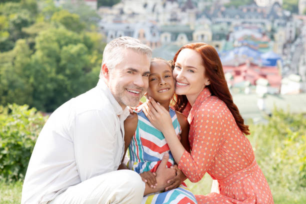 istock Beautiful family feeling amazing while walking with nice city view 1170968316