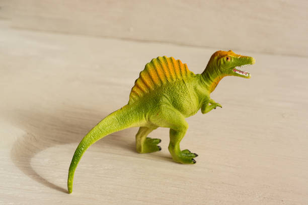 istock predatory spinosaurus with open mouth, plastic dinosaur figures of extinct ancient creatures and  favorite toys of kids 1170969265