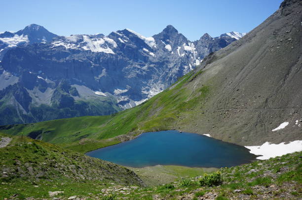 istock Jungfrau mountains and Grauseeli lake from Muerren Schilthorn 1170973243