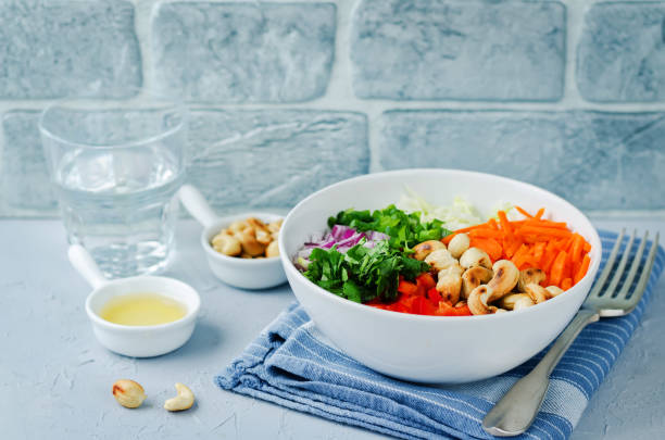 istock Cabbage red bell pepper carrot parsley cashews salad 1170976466