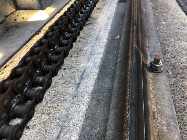 istock Metal gate drive chain and track 1170988693