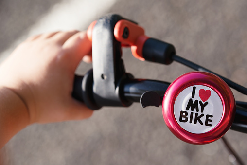 Kid's bicycle ring bell with text I love my bike