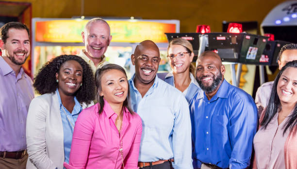 istock Corporate team building at amusement arcade 1170991243