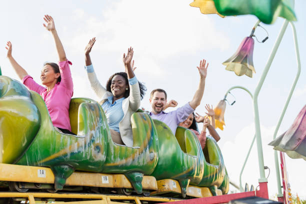 istock Corporate team building on amusement park rollercoaster 1170992513