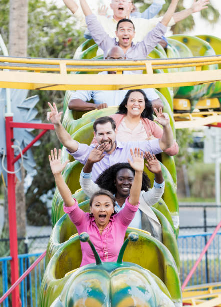 istock Corporate team building on amusement park rollercoaster 1170992516