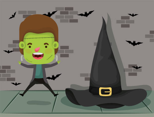 istock little boy with costume of frankenstein and witch hat 1170995697
