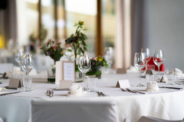 istock room with decorated wedding tables with flowers and Menu card 1170997469
