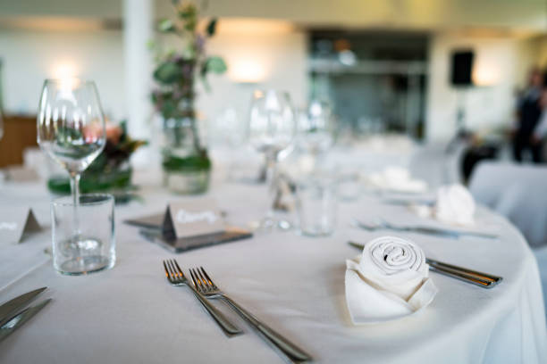 istock room with decorated wedding tables with flowers and Menu card 1170997829