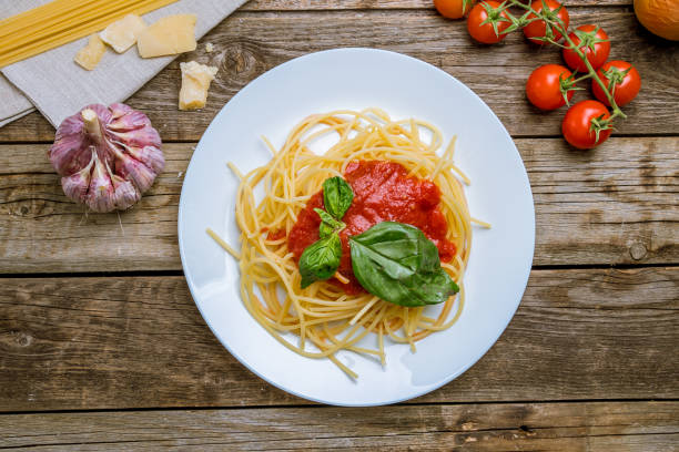 istock Spaghetti with vegetables in tomato sauce 1171007047