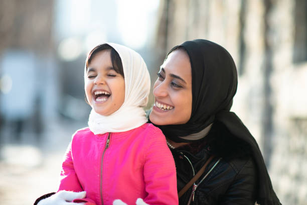 istock Smiling Muslim mother and child 1171009755
