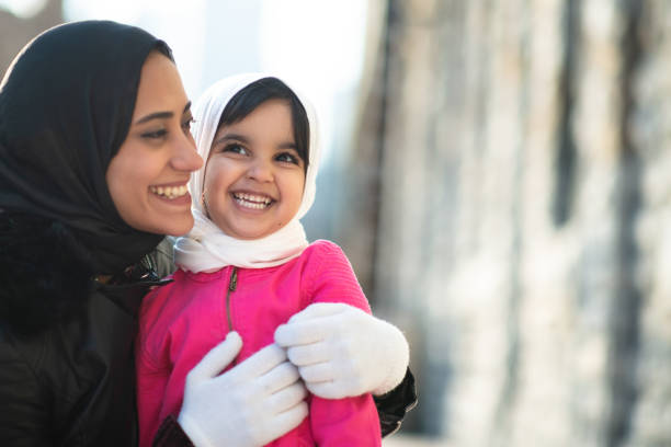 istock Smiling Muslim mother and child 1171009773