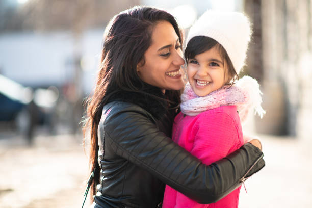 istock Smiling Muslim mother and child 1171009784