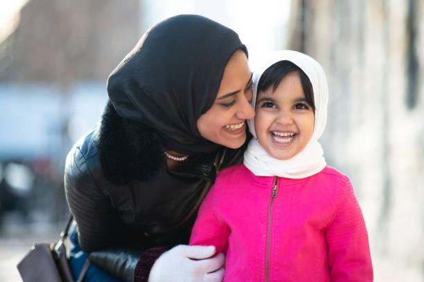 istock Smiling Muslim mother and child 1171009816