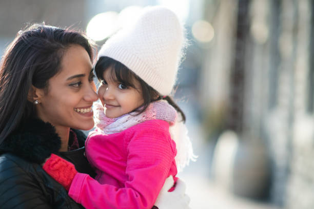 istock Smiling Muslim mother and child 1171009842