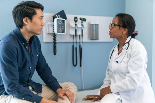 istock Korean man in consultation with doctor 1171010300