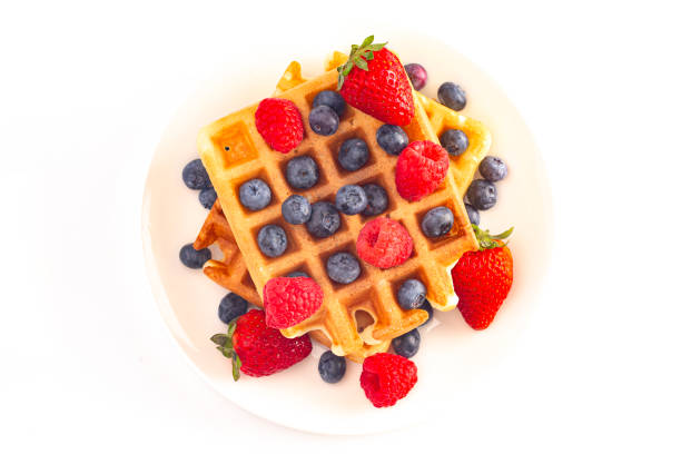 istock Two Berry Waffles Isolated on a White Background 1171019399