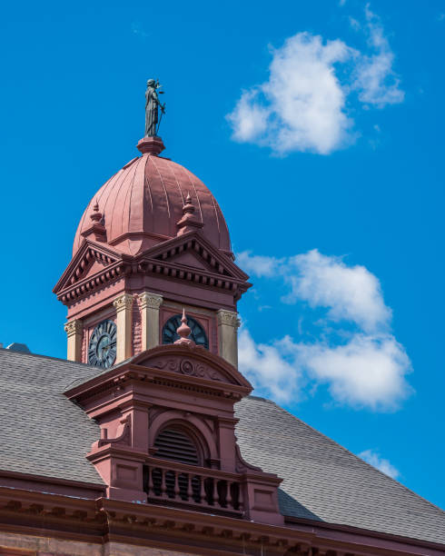 istock Clock tower on the top of city hall 1171024831