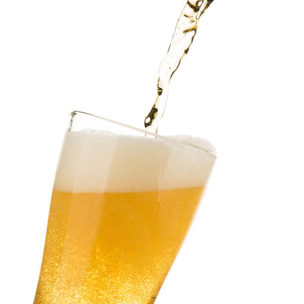 istock Beer pouring on glass isolated on white background food and drink beverage celebration object design 1171027297