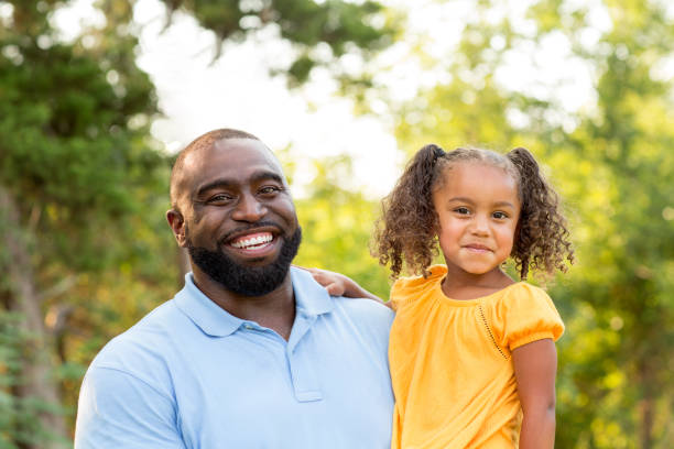 istock Father laughing and playing with his daugher. 1171027305