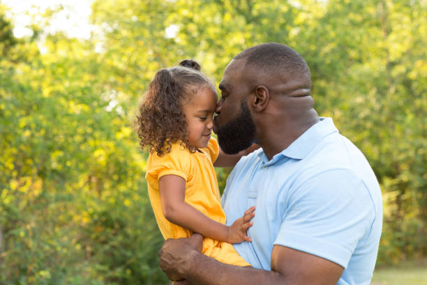 istock Father laughing and playing with his daugher. 1171027311