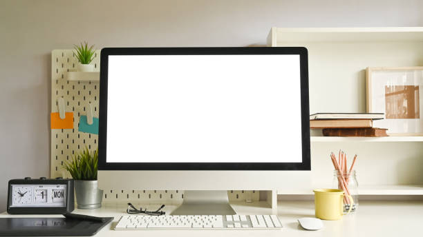 istock Workspace mockup computer, pegboard, shelves and office supply on creative office desk. 1171030035