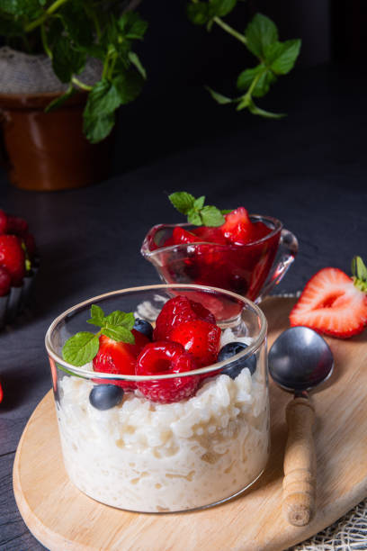 istock delicious milk rice with different berries and red fruit jelly 1171041659