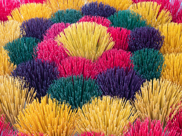 istock Incense Sticks Arranged by Color From Above 1171050105