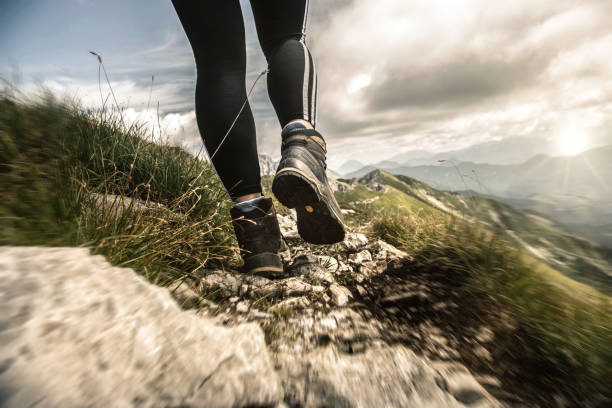 istock Young fitted woman trail running 1171052529